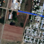 Vista del terreno en venta en Cañada de Gómez, ideal para uso industrial.